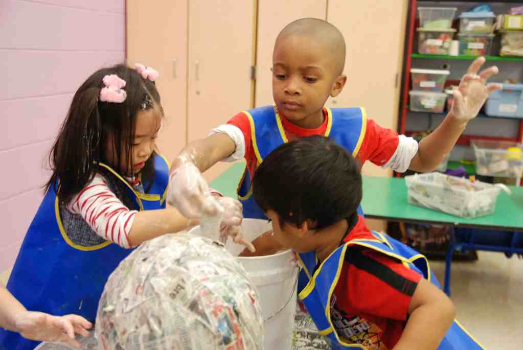 Three Glenview New Church school student working on an art project