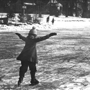 A young girl skates on the Park Lake near the Glenview New Church School in the early 1900's