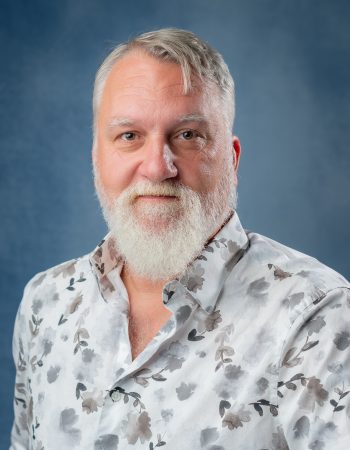 Headshot pf Glenview New Church School Associate Pastor Elmo Acton